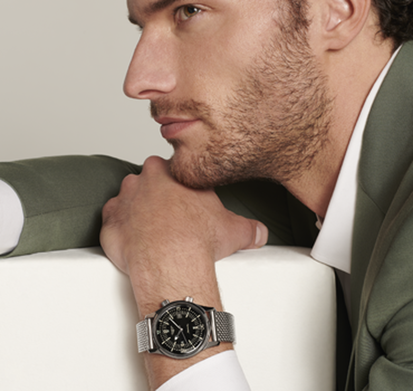 A man wearing a Longines watch.